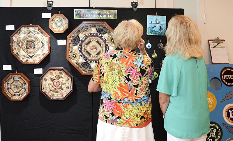 Constance Marshall Miller shows off her sailor valentines.